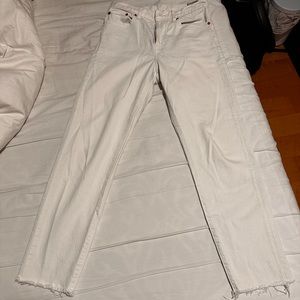 Levi’s white jeans with raw hem